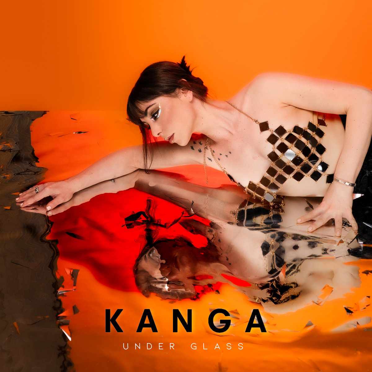 Kanga, “Under Glass”